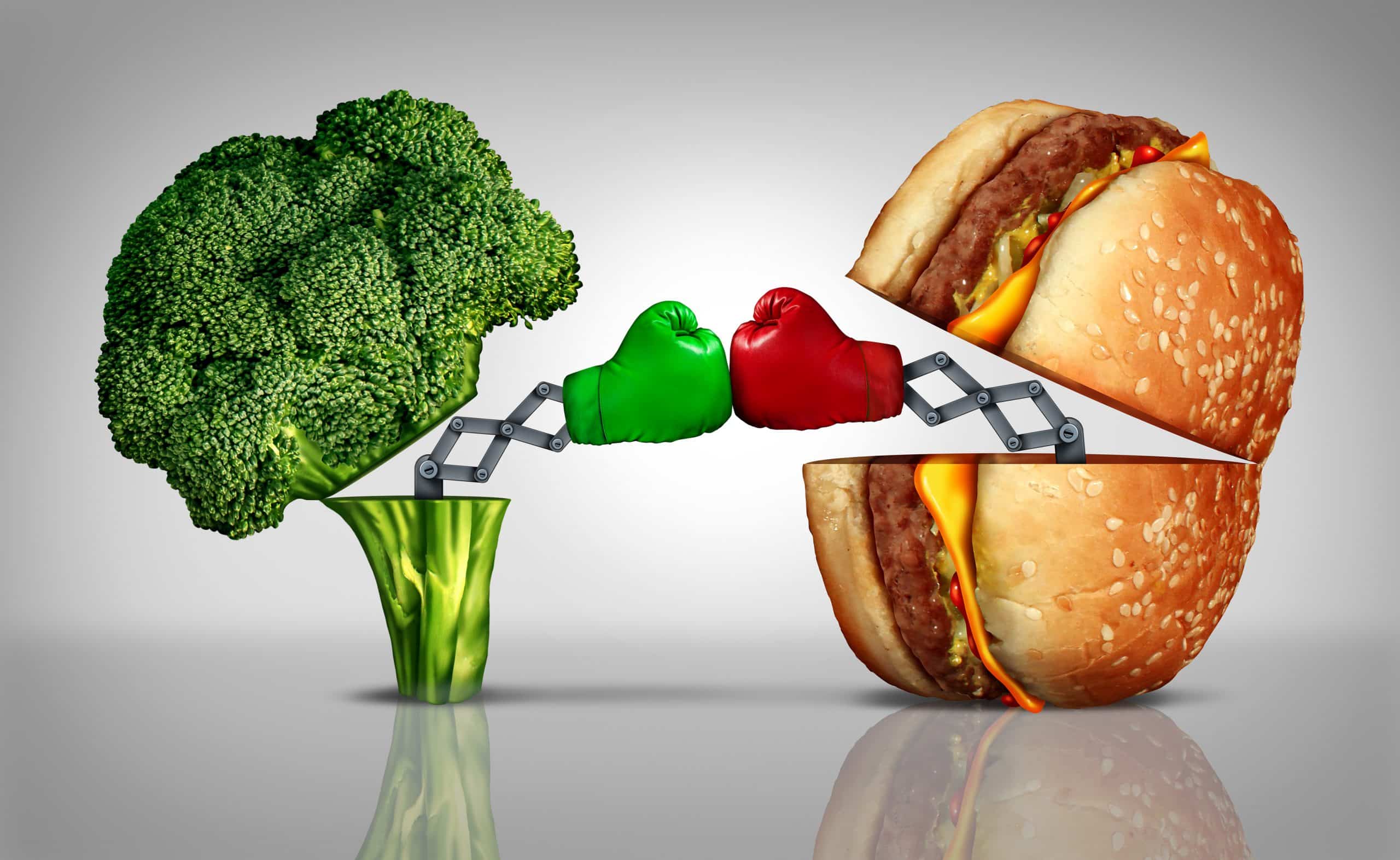 Broccoli and a cheeseburger boxing each other